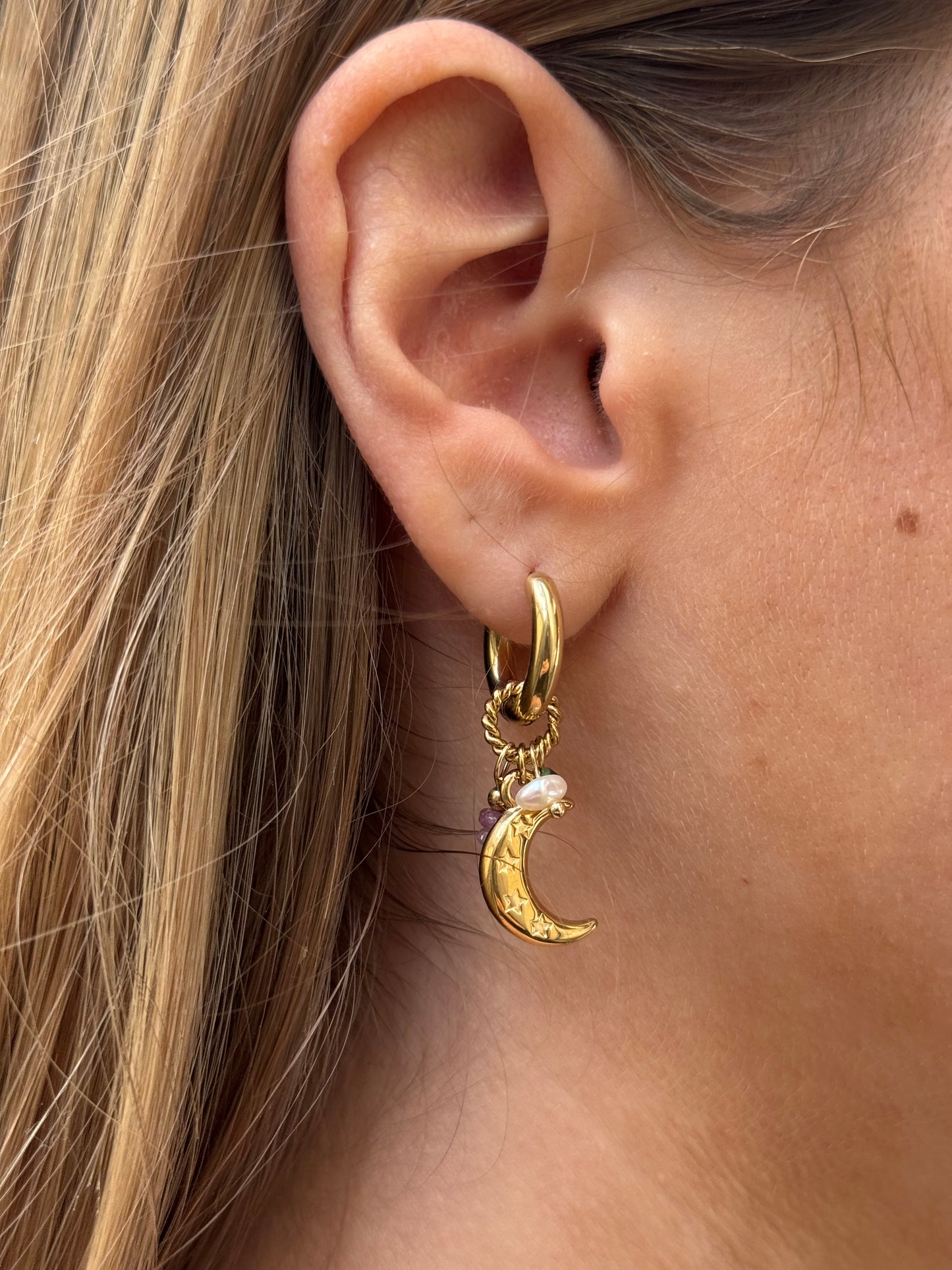 Boucles d’oreilles astres asymétriques